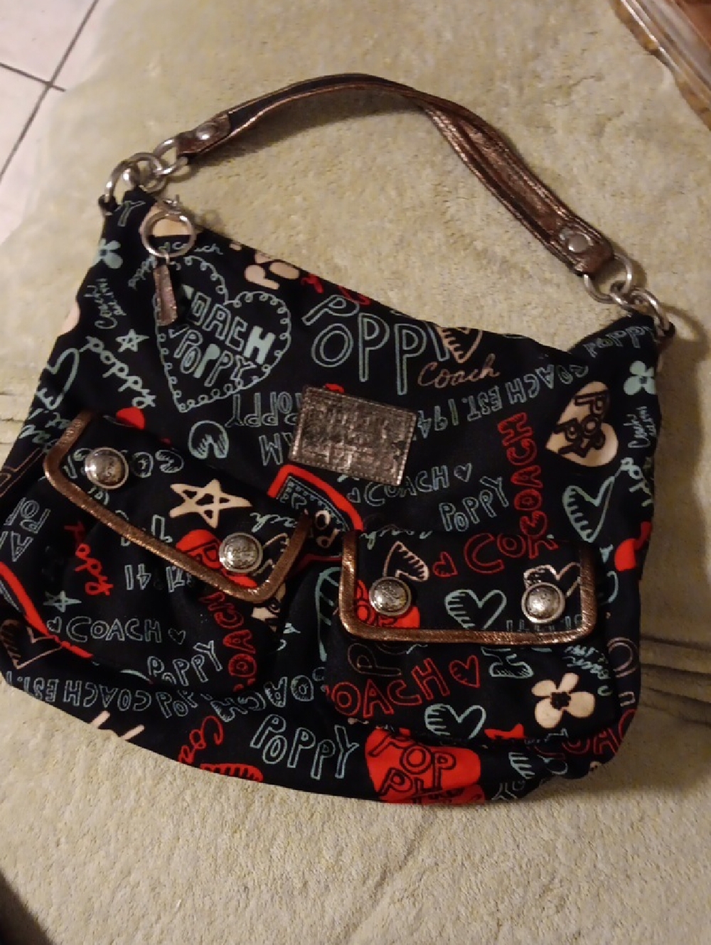 Coach Black Poppy-Print Shoulder Bag with Metallic Bronze Trim
